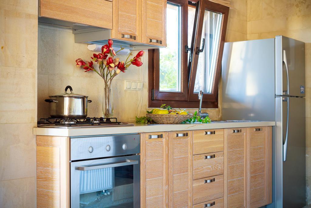 Aparthotel Pezoulia Selakano Habitación foto